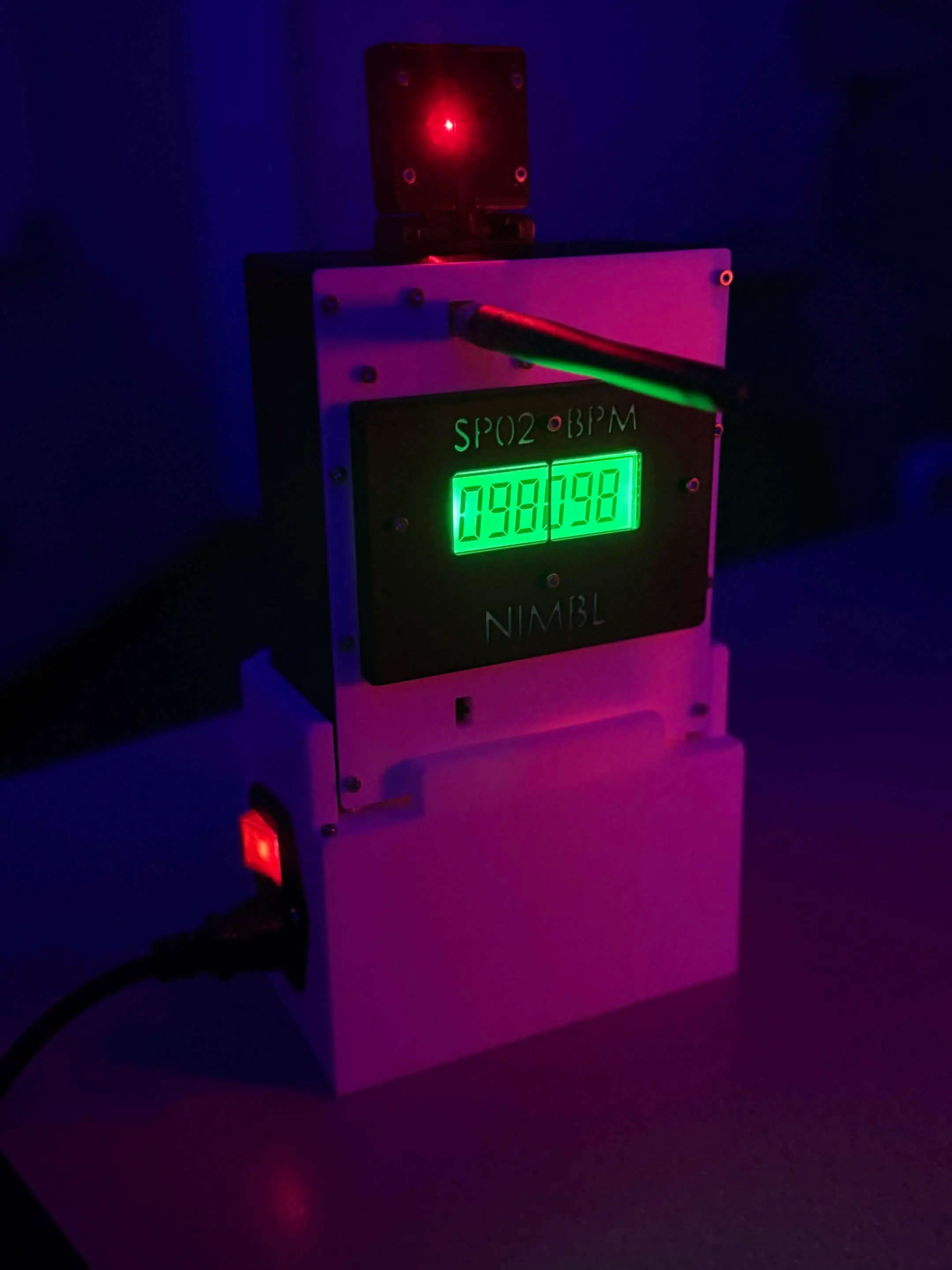 Fully designed NIMBL device showing the PPG sensor and LCD display
