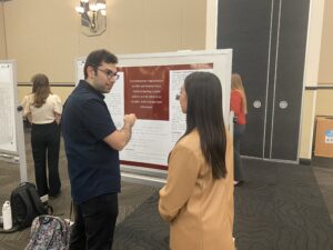 students with poster at Student Research Week