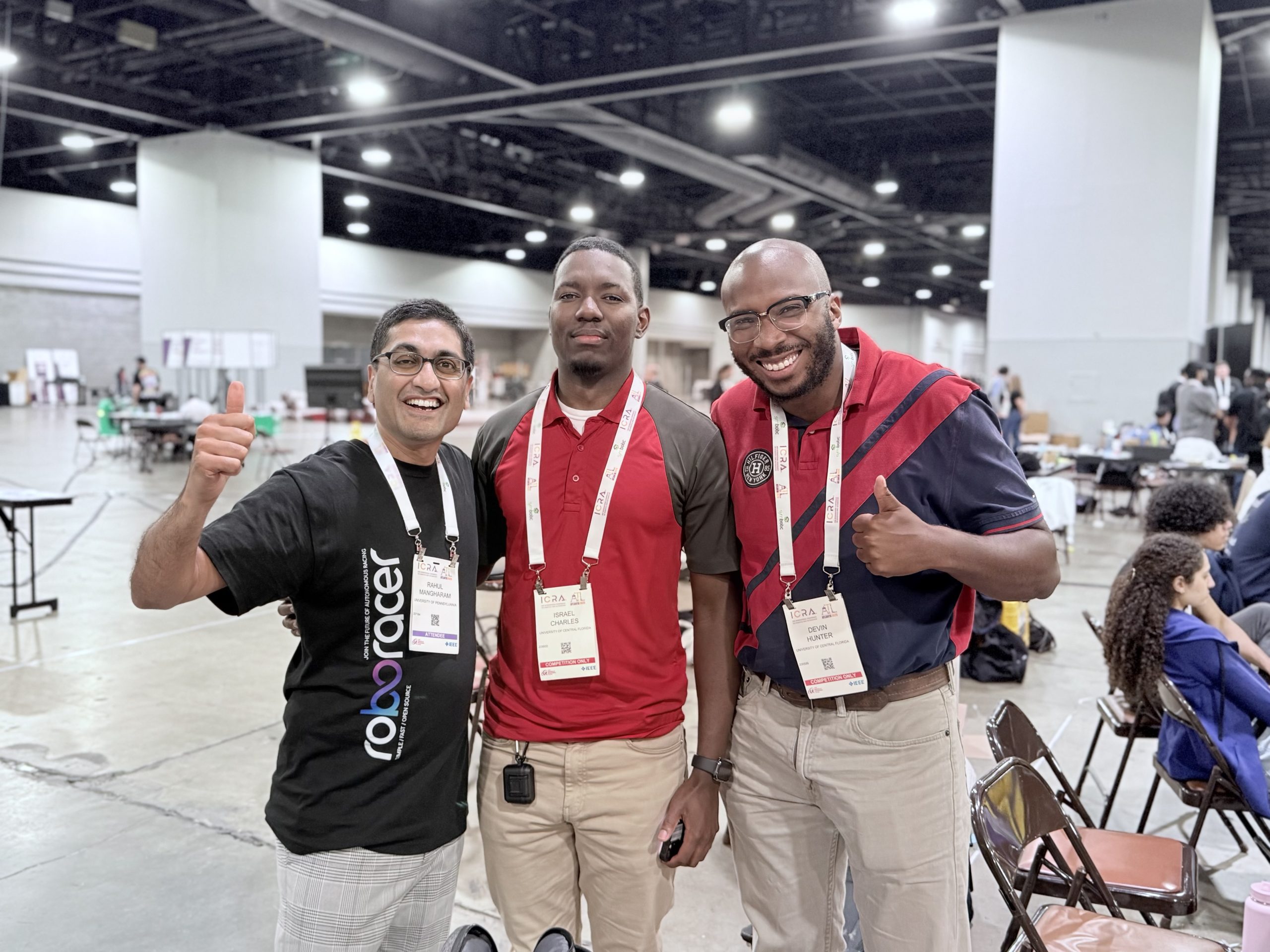 Israel Charles (center)