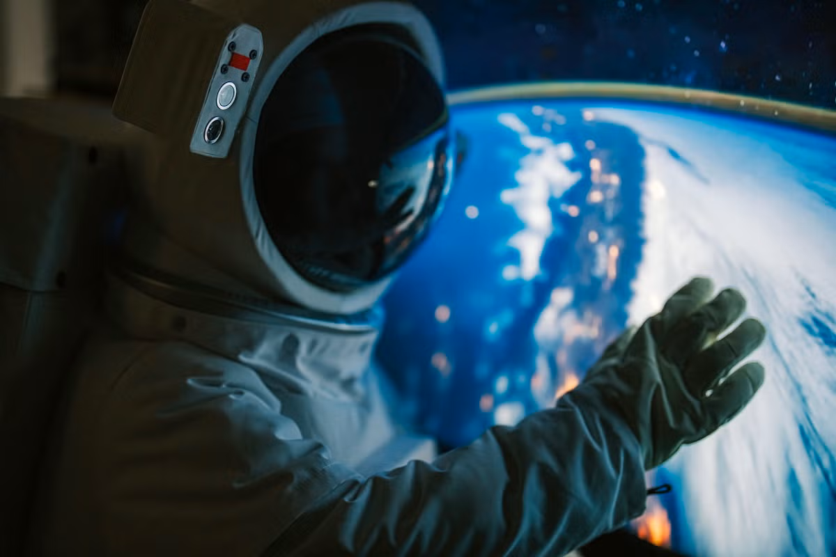 astronaut viewing earth from space